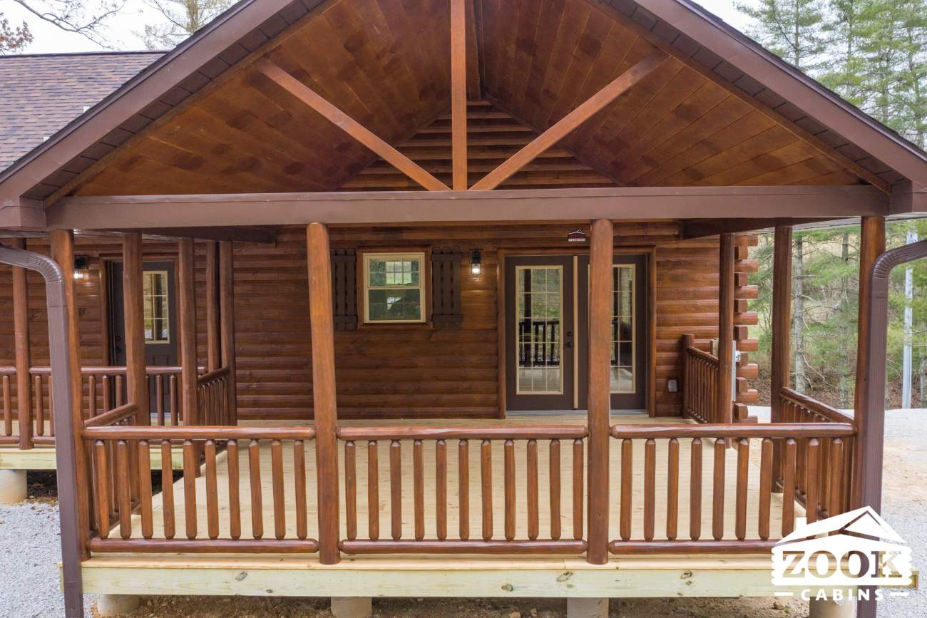 beautiful wood porch on a modular log cabin