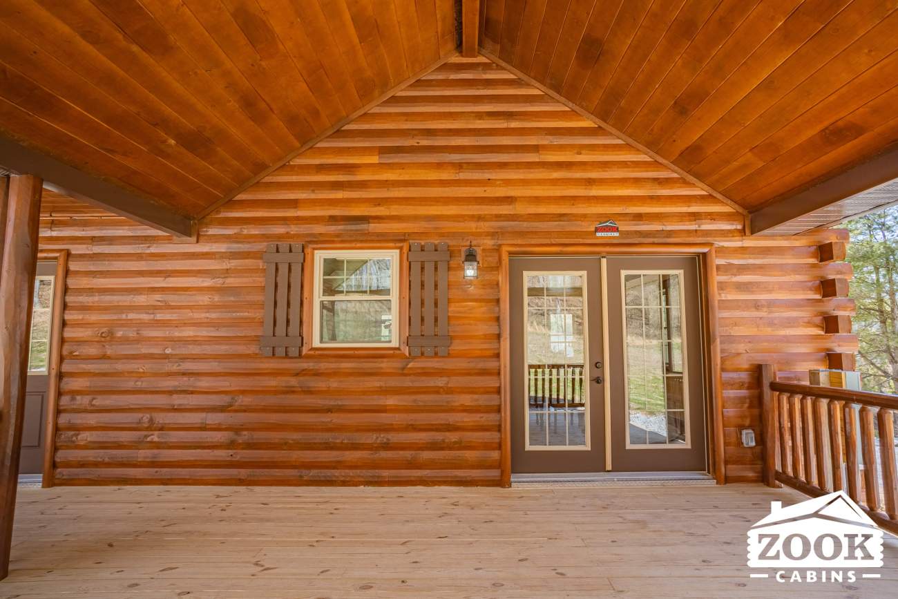 large porch on a modular log cabin home