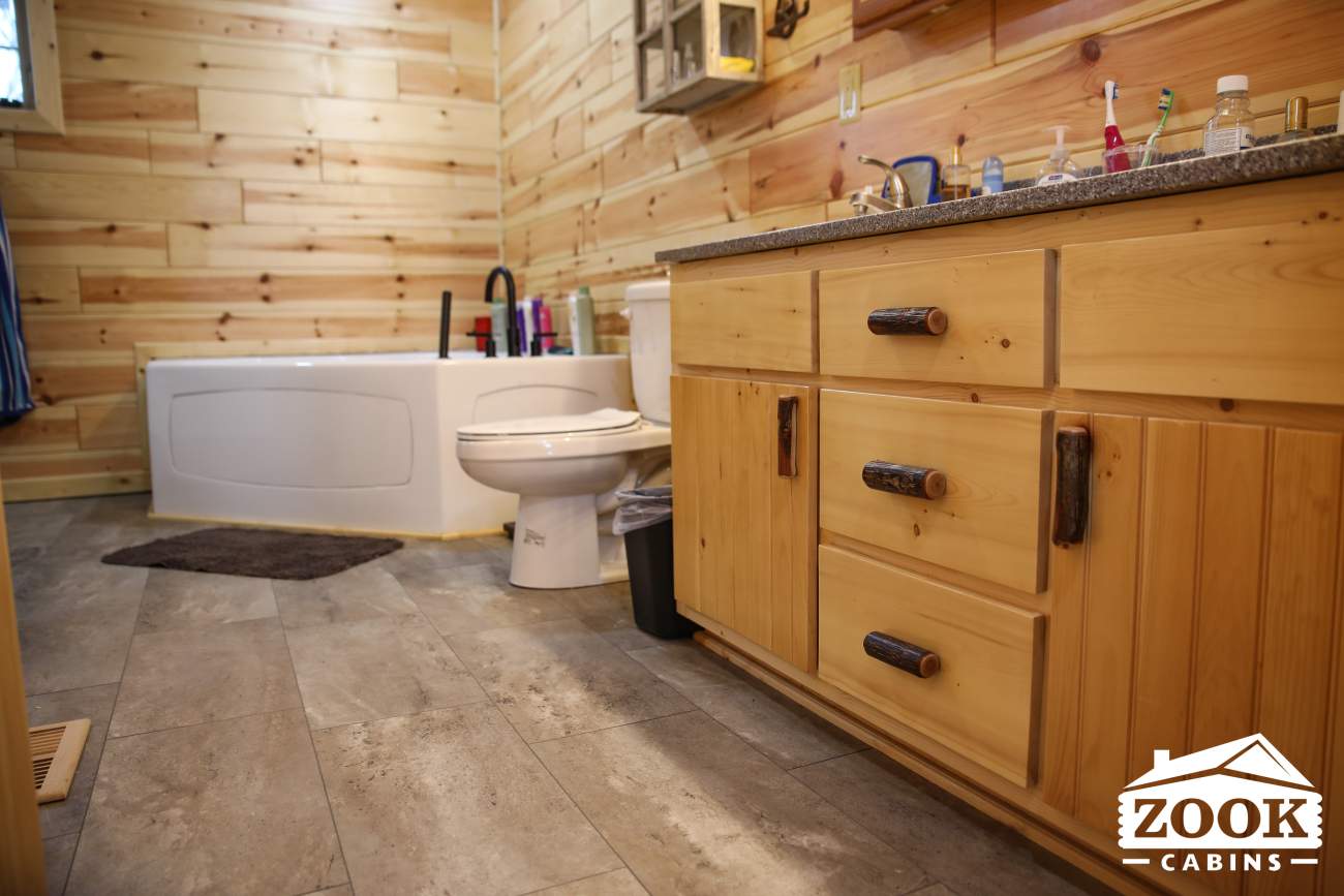 master bathroom in a log cabin