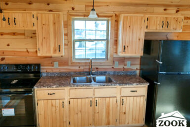 small cabin with a kitchen
